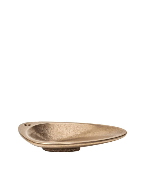 AESOP bronze incense holder. Sculptural metal accessory designed for incense rituals and refined interior styling.