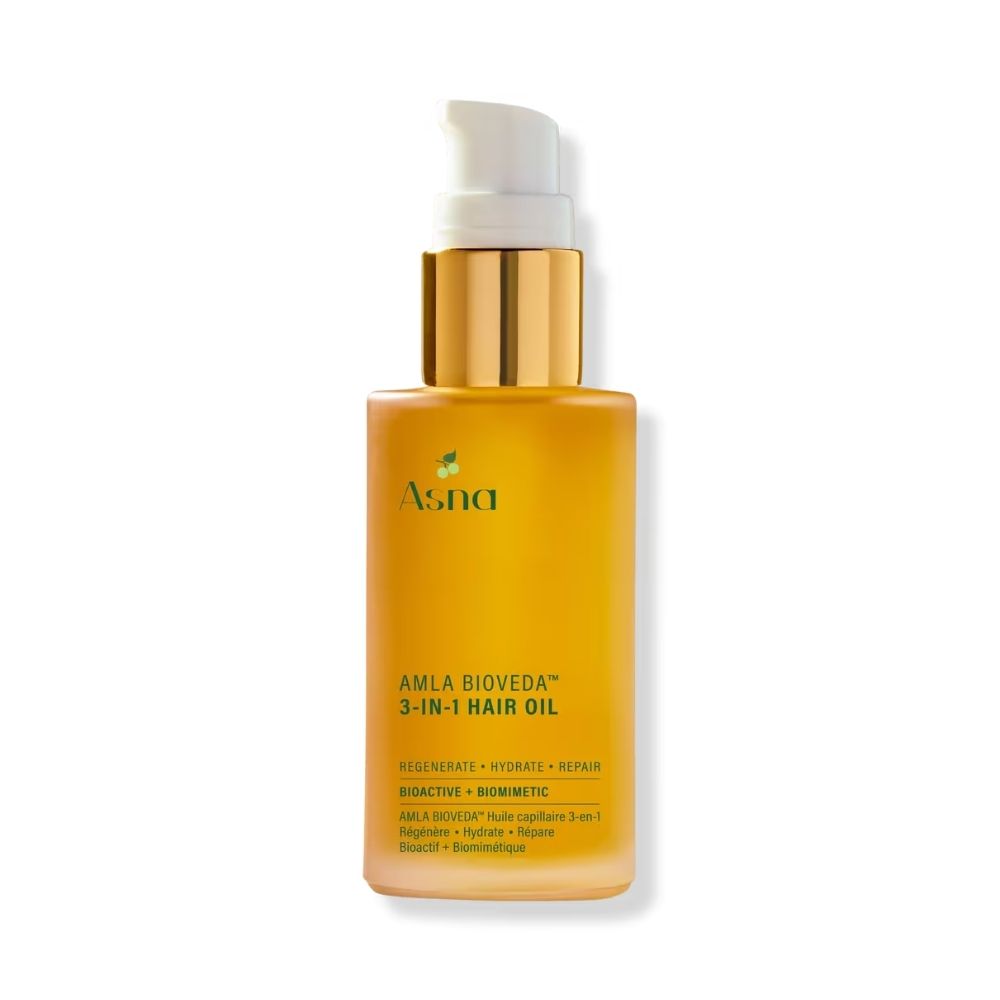 ASNA Amla BioVeda Hair Oil nourishes hair and scalp while helping improve softness and shine.