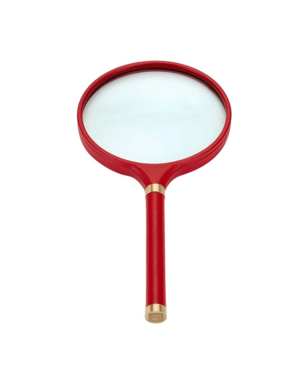 ASSOULINE archival magnifying glass in red pebbled leather. Refined desk accessory for modern interiors.