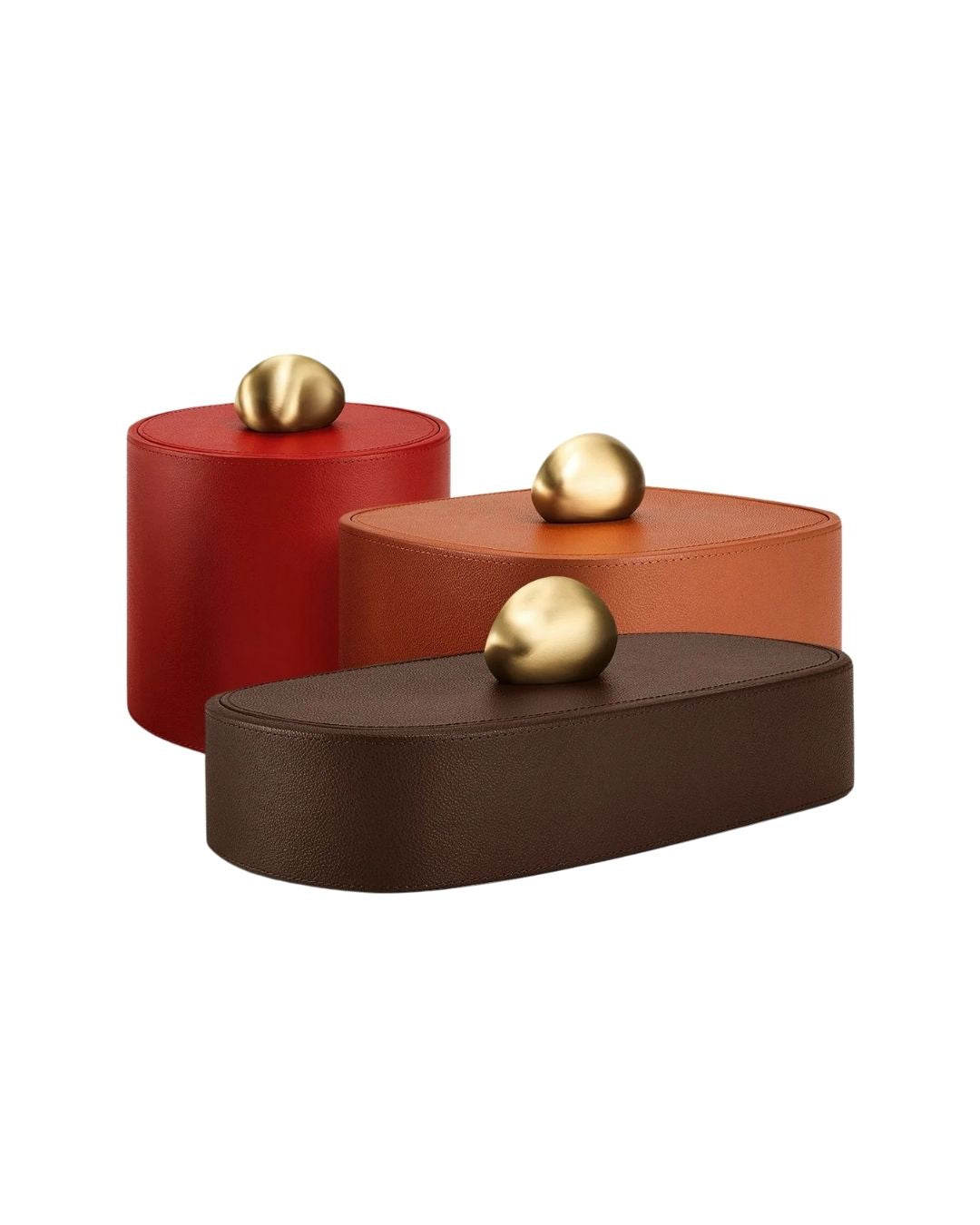 ASSOULINE pebble trinket box trio. Sculptural leather storage set for desks, shelves, and curated interiors.